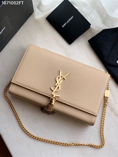 ysl monogram metallic clutch|YSL monogram clutch dark beige.